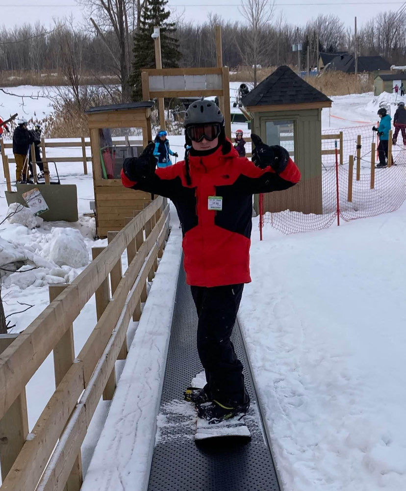 image de moi en train de faire du snowboard